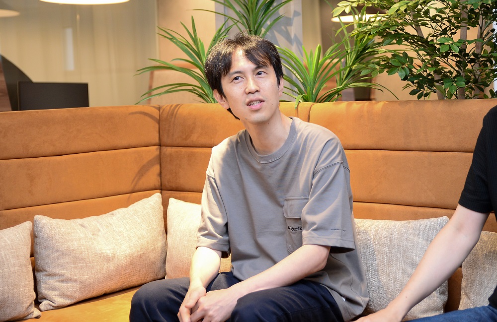BNS Masayuki Suzuki talking during the interview